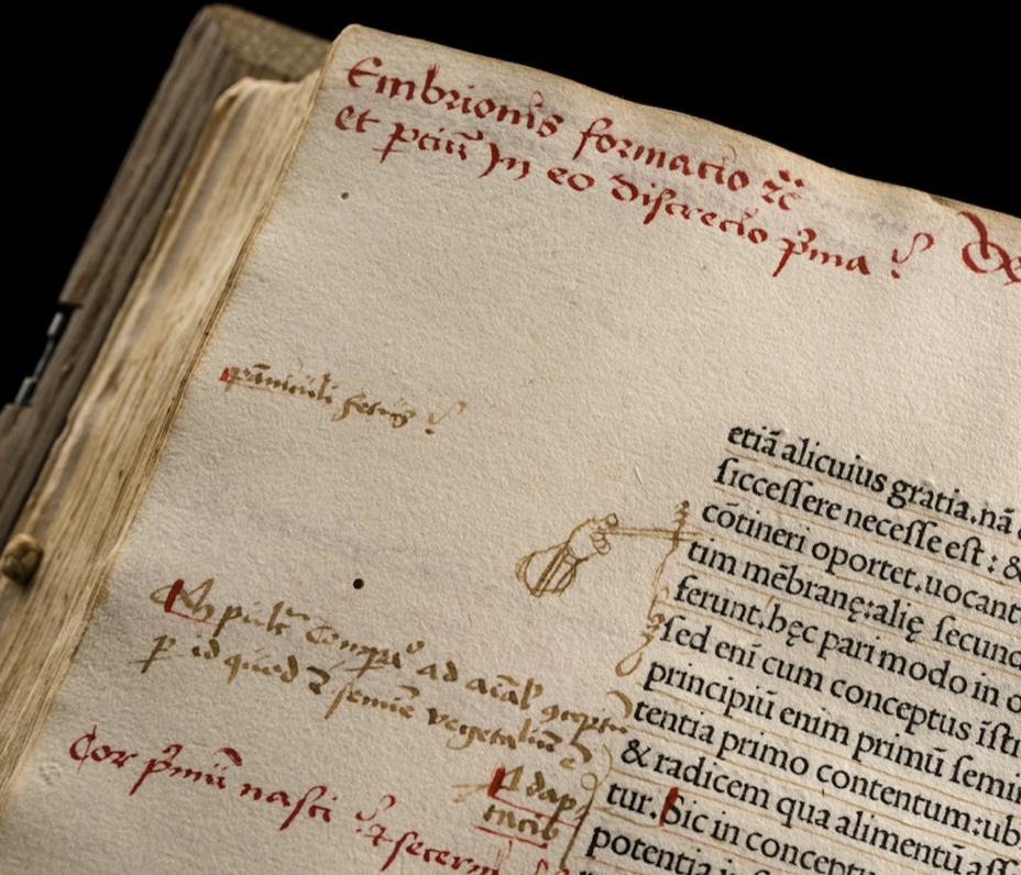 Photo of part of page from 1476 book (Aristotle's work on animals); Latin text and marginalia visible.