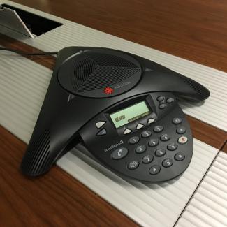 Polycom telephone on table