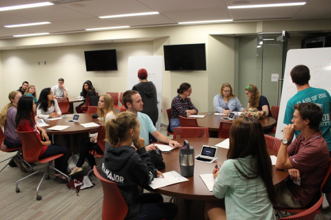 A group of people in the Active Learning Classroom