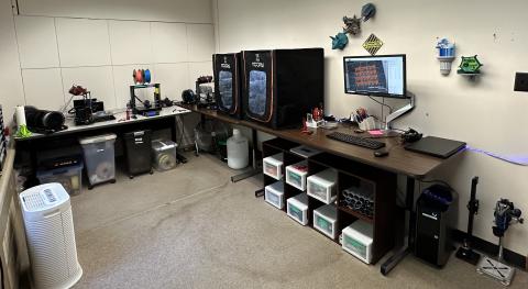 A photo of the Research 3D Printing Lab and its printers.